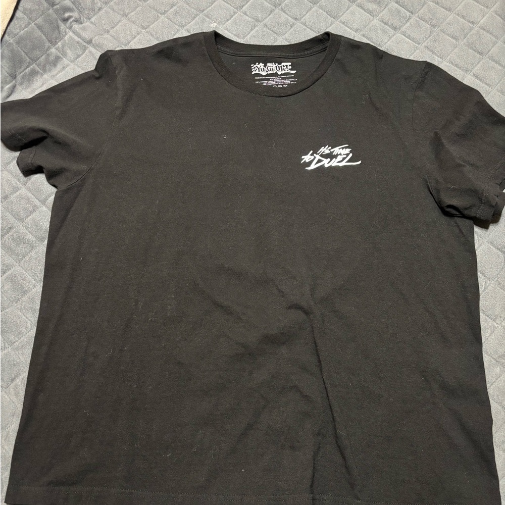 Black Graphic Tee by [Brand]